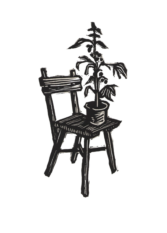 Hand-printed linocut illustration of a garden chair with a potted plant on top, drawn on BFK Rives paper.